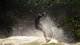 Munich surfers left high and dry as famed river wave vanishes
