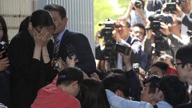 Court frees first class macadamia ‘nut rage’ woman