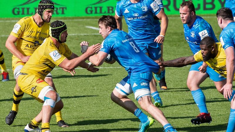 Leinster’s Irish number 8 Jack Conan is tackled by La Rochelle’s prop Dany Priso (R) and French flanker Gregory Alldritt. Photograph: Xavier Leoty/Getty/AFP