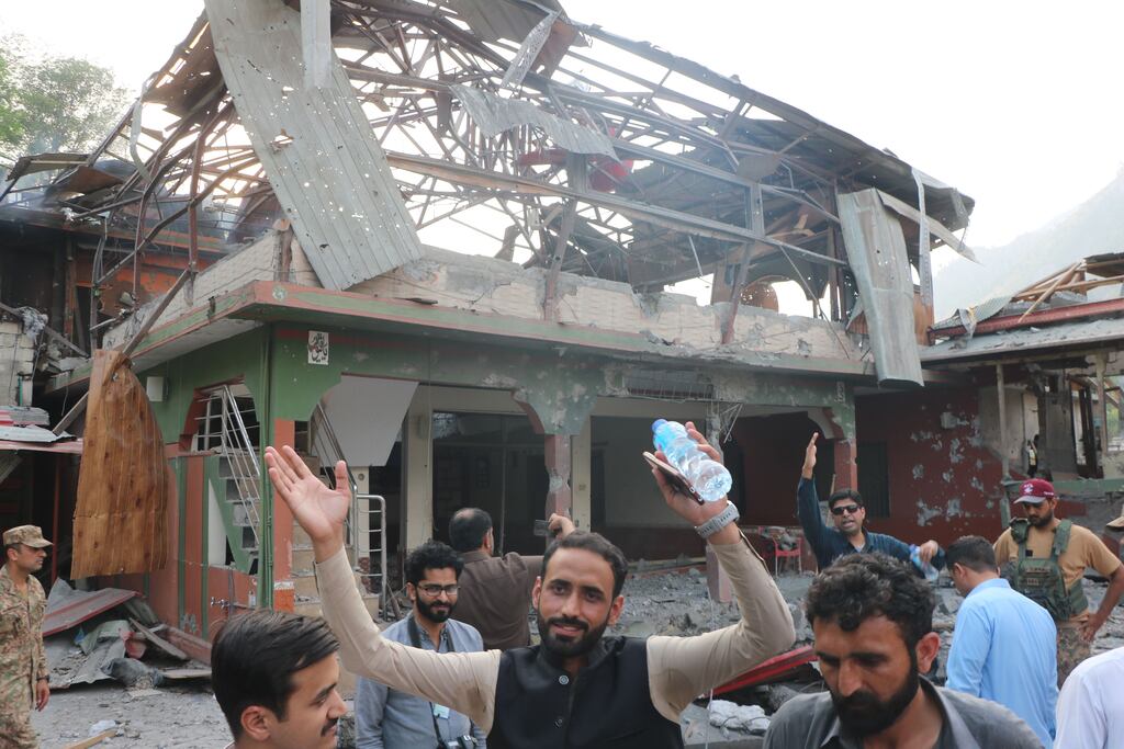 Locals gather at Bilal Mosque in Muzaffarabad, the capital of Pakistani-administered Kashmir, following India's missile strike. Photograph: Amiiruddin Mughal/EPA
.