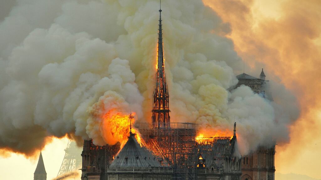 Notre Dame: flames and smoke billow from the roof of the Paris cathedral. Photograph: Thierry Mallet/AP
