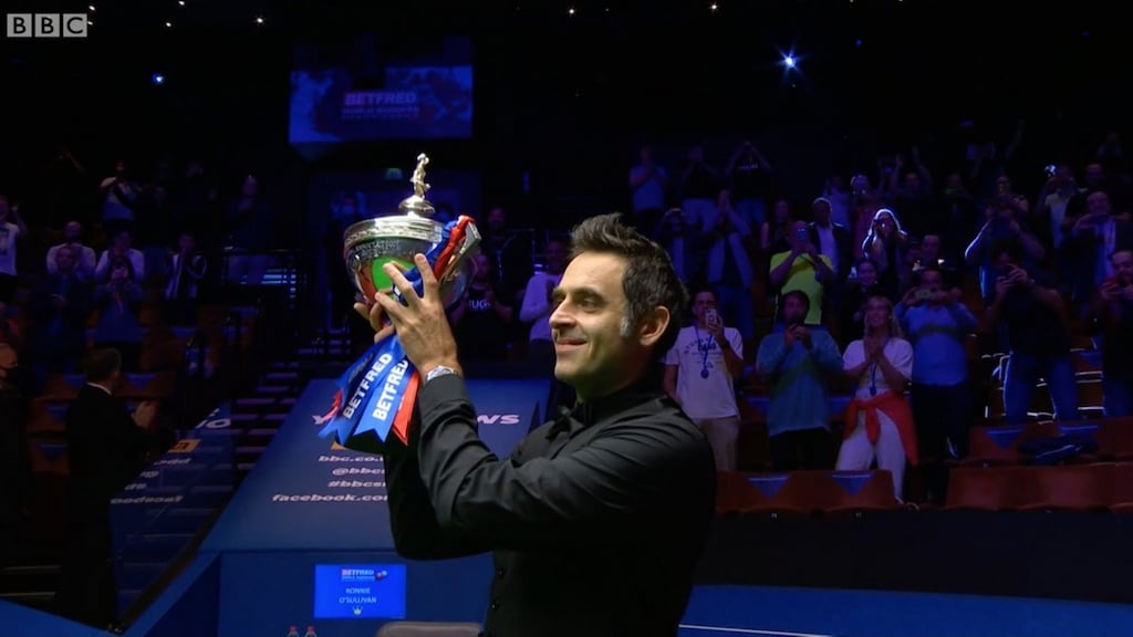 Ronnie O’Sullivan lifting the Betfred World Snooker Championship trophy at the Crucible in Sheffield on Sunday night. Photograh: PA/BBC
