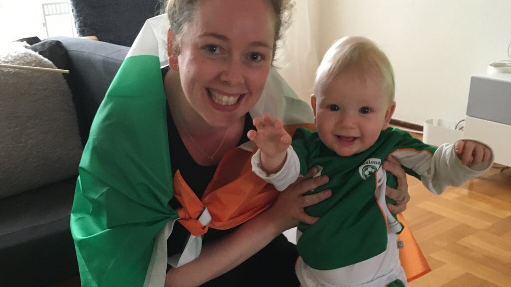 In Sweden: Grace Lovquist with her daughter Allison in Sweden. ‘When Ireland and Sweden were drawn in the same group, I immediately put in an order from home for our baby’s first Irish kit.’