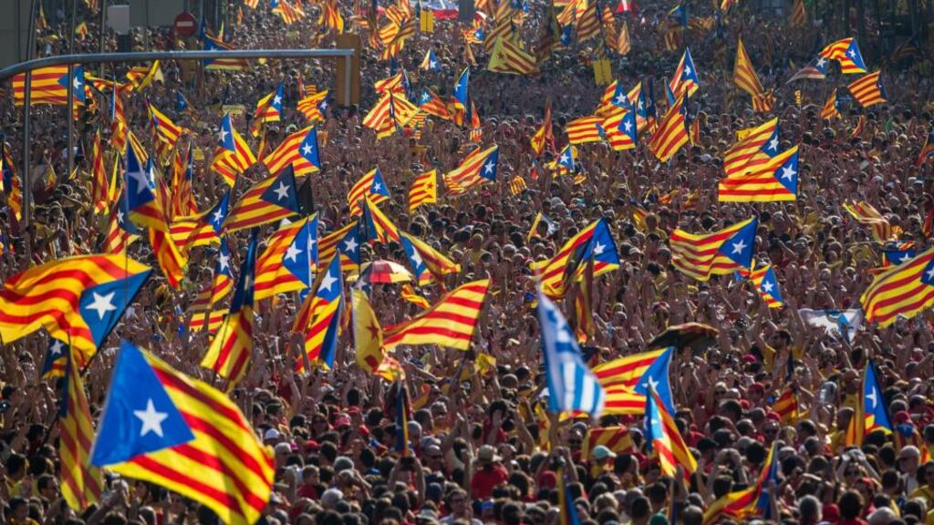 Demonstrators march during a pro-independence demonstration as part of the celebrations of the National Day of Catalonia in Barcelona yesterday Photograph: David Ramos/Getty Images
