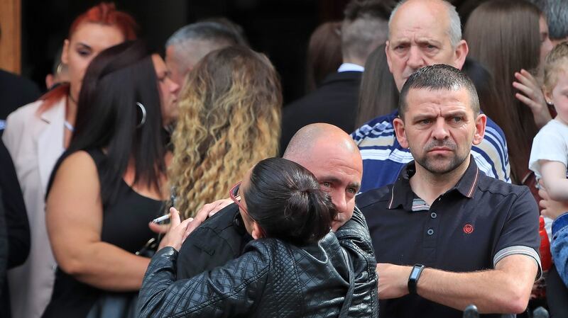 Members of family and friends of the late Michael Keogh console each other after his funeral Mass this morning at St Francis Xavier Church, Gardiner Street, Dublin. Photograph: Colin Keegan/Collins Dublin