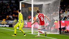 Arsenal return to top of Premier League with win at Wolves