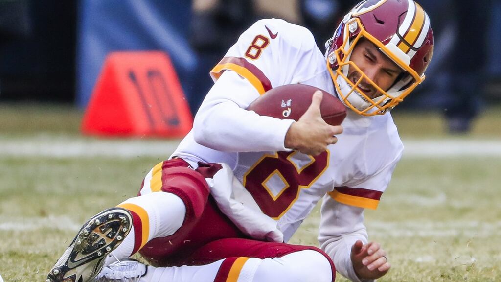 Kirk Cousins threw a late interception as Washington’s hopes of reaching the play-offs ended against the Giants. Photograph: Epa/Tannen Murray