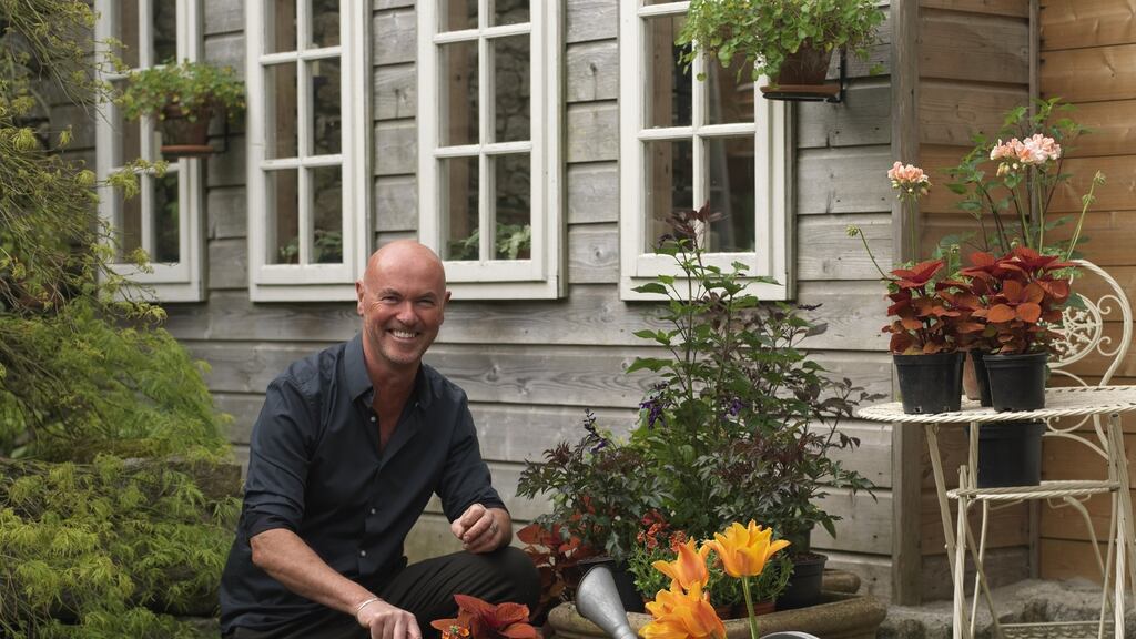 TJ Maher in his garden Patthana in Co Wicklow, planting summer containers. Photograph: Richard Johnston