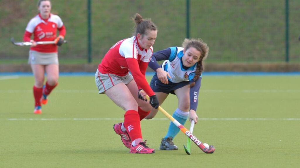 Pegasus’s Grace Irwin in action against Andrea Desneaux of Ulster Elks during the recent Irish Hockey League clash. Photo: Rowland White/Inpho