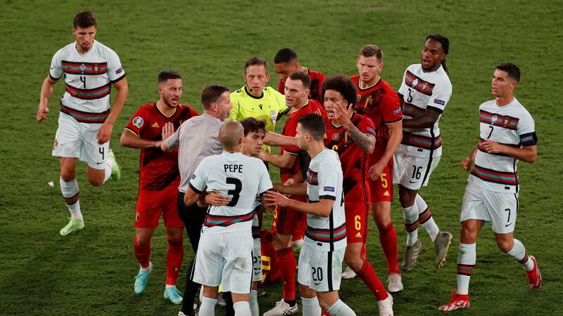 Tempers flare during Belgium’s 1-0 win over Portugal in Seville. Photograph: Jose Manuel Vidal/AP
