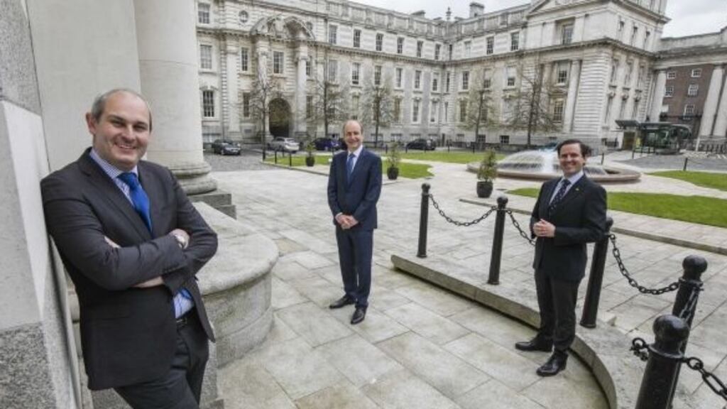 Mark Cockerill of ServiceNow, Taoiseach Micheál Martin and Martin Shanahan of IDA Ireland: More than 80 new jobs will be created in a multimillion-euro investment. Photograph: Chris Bellew/Fennell Photography