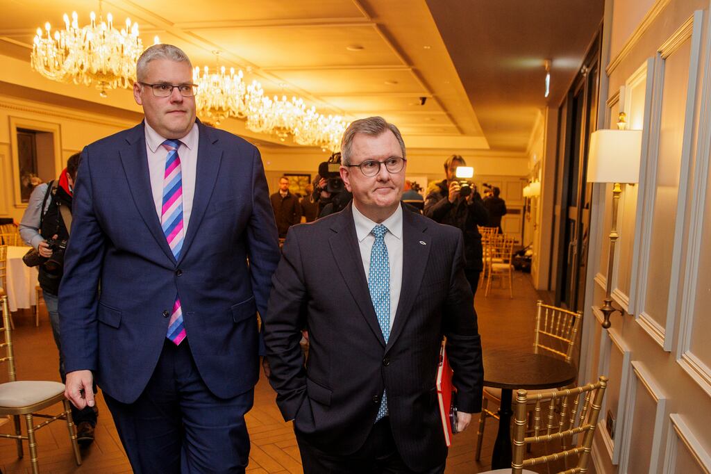 DUP leader Jeffery Donaldson MP (right) with party colleague Gavin Robinson MP leaving a press conference at Hinch Distillery, Ballynahinch, after the DUP party executive held a private party meeting about going back into Stormont. Photograph: Liam McBurney/PA Wire