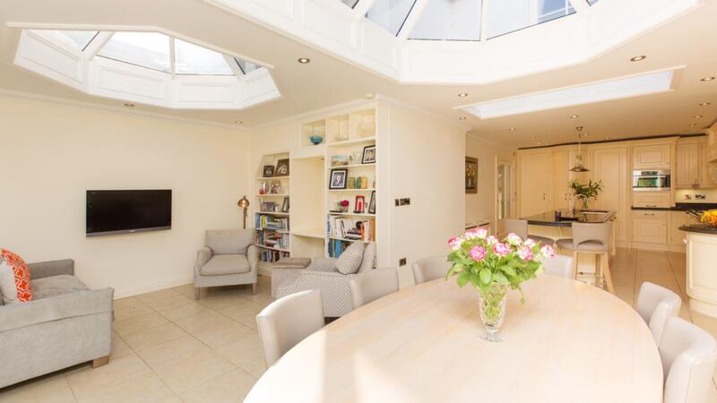 The large dining and living space to the rear of the kitchen at 66 Tritonville Road in Sandymount is remarkably bright thanks to two roof lanterns and walls of glass.