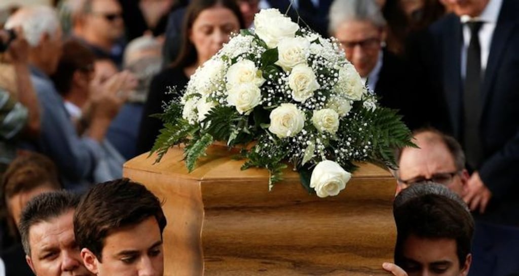 Journalist Daphne Caruana Galizia’s sons Matthew and Paul carry the coffin of their mother, who was murdered in a car bomb attack in Malta. Photograph: Reuters