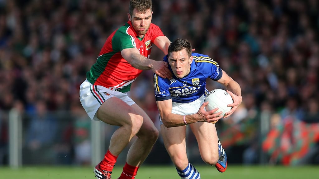 Kerry’s David Moran and Séamus O’Shea of Mayo in the side’s last championship meeting in 2014. Photograph: Cathal Noonan/Inpho