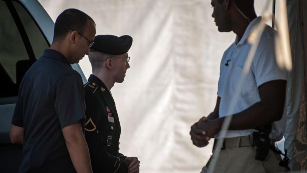 Bradley Manning being escorted into court for the continuation of the sentencing phase in his military trial at Fort Meade, Maryland, yesterday. Photograph: James Lawler Duggan/Reuters