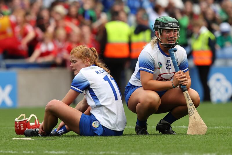 Waterford's Beth Carton and Laoise Forrest dejected after the final whistle. Photograph: Bryan Keane/Inpho