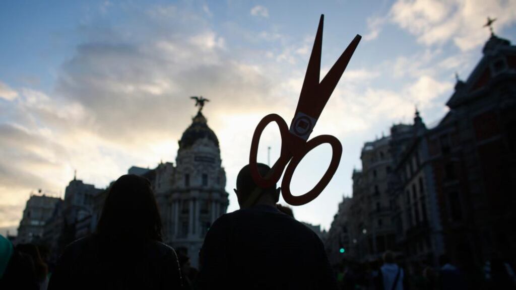 Cut to the quick: an anti-austerity protester in Madrid. Without emigration, youth unemployment here might be higher than in Spain. Photograph: Paul Hanna/Reuters