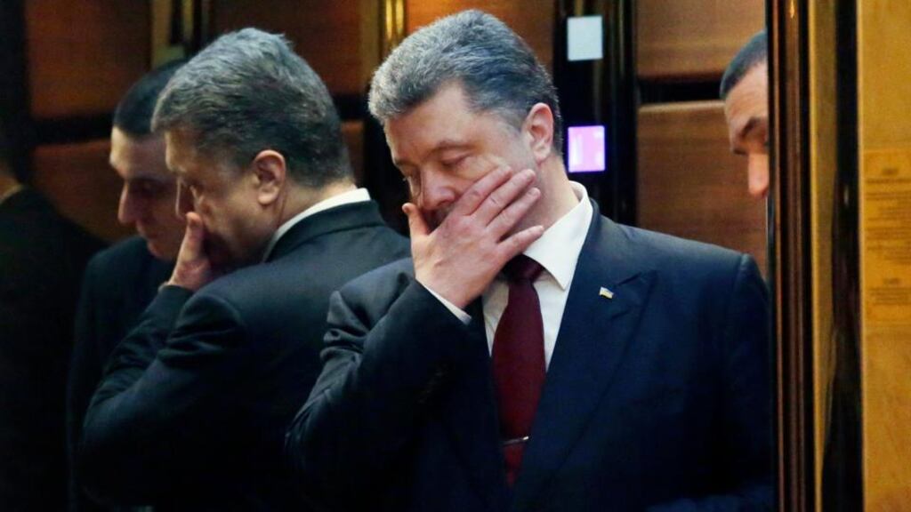 Ukrainian president Petro Poroshenko in a lift as he leaves the Ukrainian peace negotiations in Minsk, Belarus: The White House has called the truce deal “potentially significant”, but urged Moscow to withdraw troops and armour and give Ukraine control over its own border. Photograph: Tatyana Zenkovich/EPA