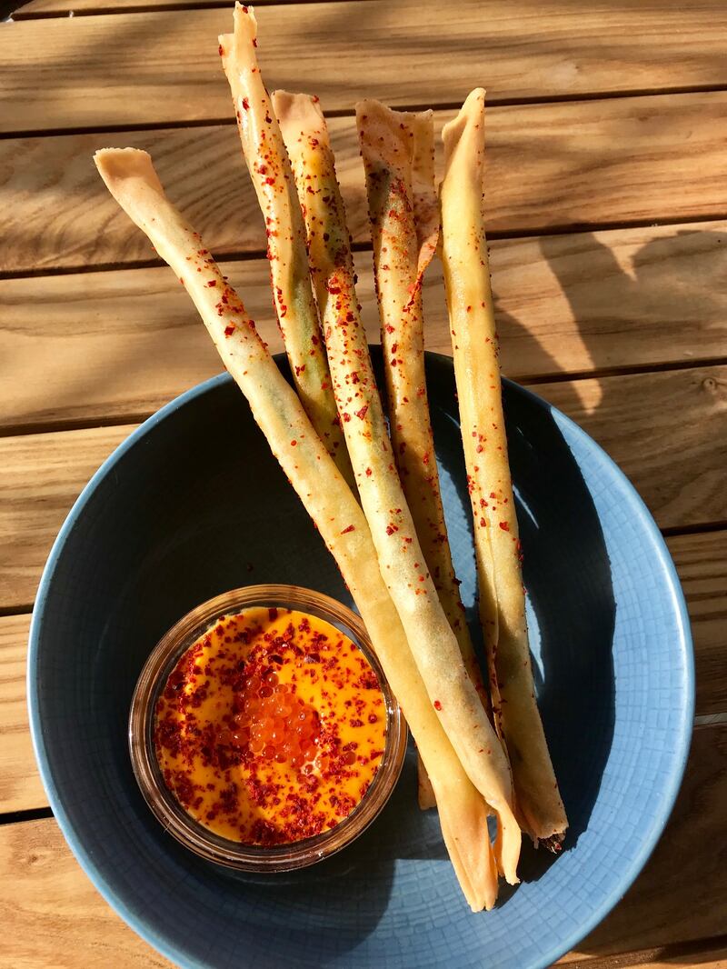 Asparagus spring rolls, trout roe, hollandaise