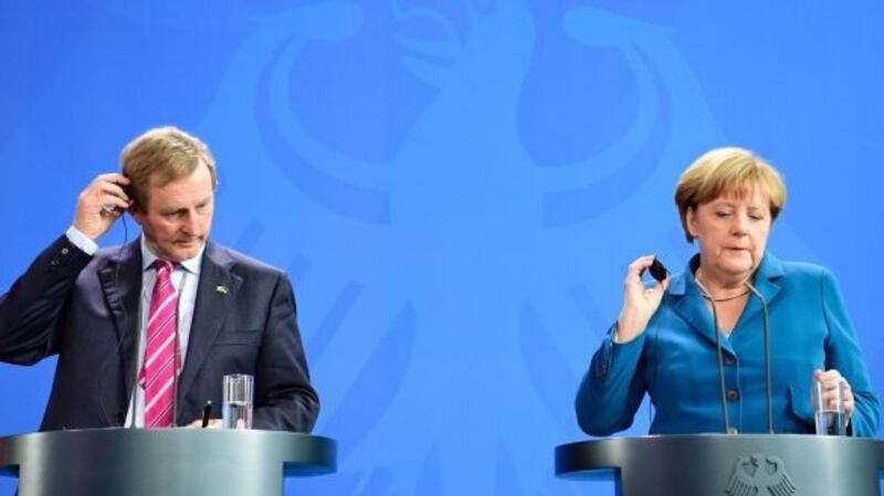 Taoiseach Enda Kenny and German chancellor Angela Merkel in Berlin last July. File photograph: John MacDougall/AFP/Getty Images