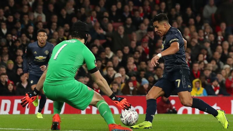 Sanchez goes around Petr Cech for United’s opener. Photo: Daniel Leal-Olivas/Getty Images