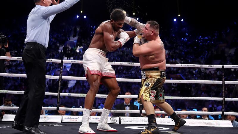 Andy Ruiz Jr tries to get inside Anthony Joshua ’s guard during the heavyweight title fight in Diriyah, Saudi Arabia. Photograph: Nick Potts/PA Wire