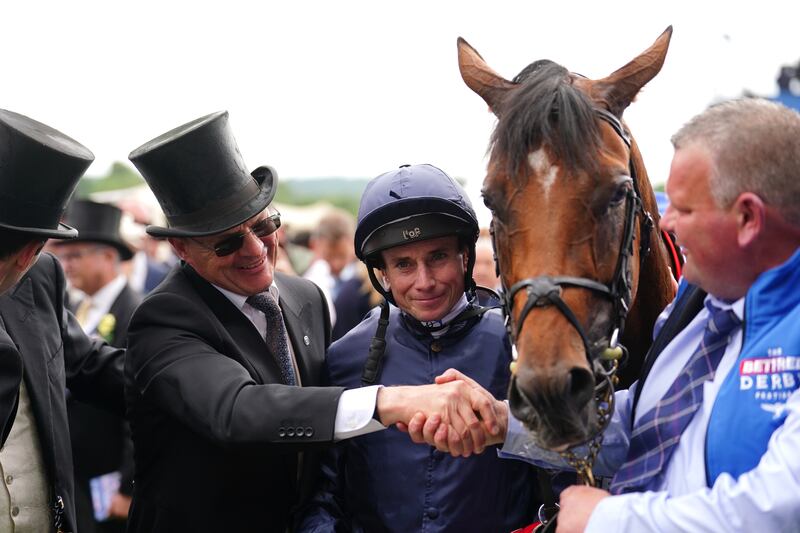 Aidan O'Brien and Ryan Moore after winning the Betfred Derby with City Of Troy. Photograph: David Davies/PA Wire for The Jockey Club