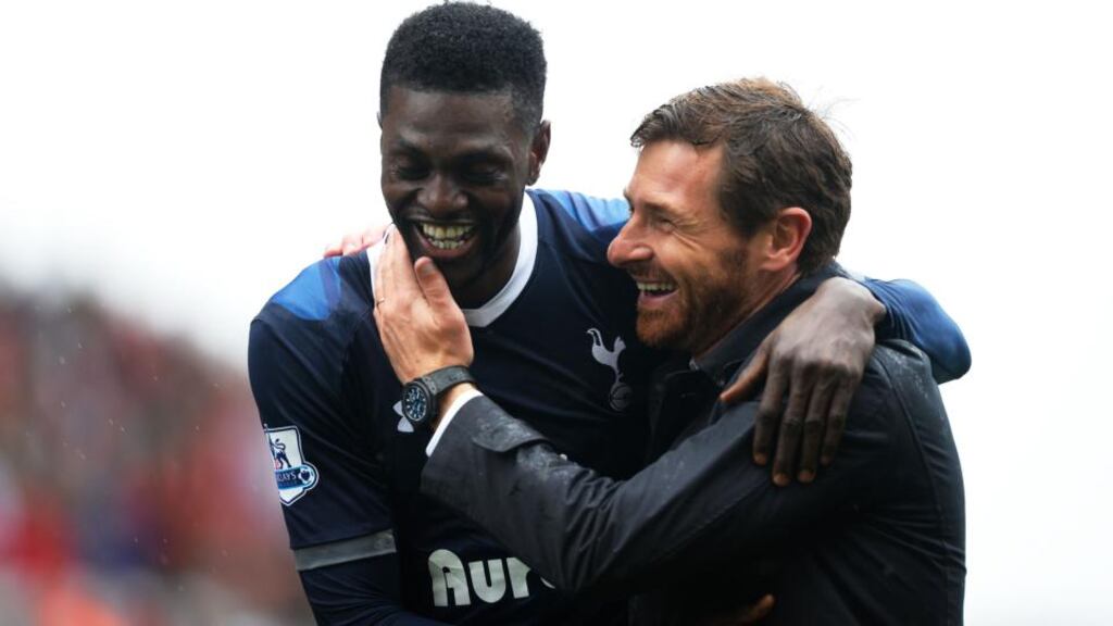 Emmanuel Adebayor is congratulated by Spurs manager Andre Villas-Boas after scoring the winning goal against Stoke City in the Premier League match at the Britannia Stadium. Photograph: Laurence Griffiths/Getty Images