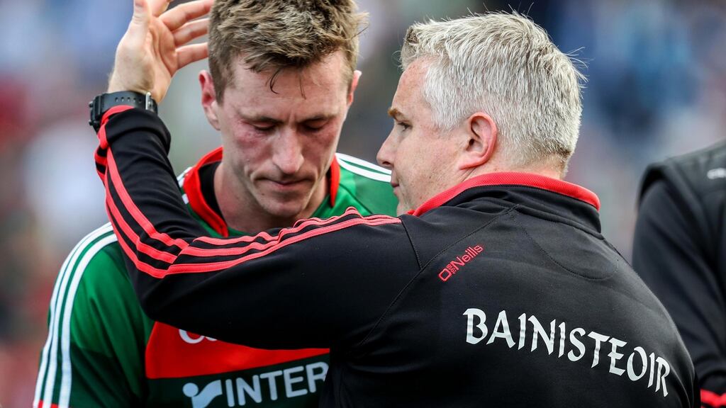 Mayo manager Stephen Rochford consoles Cillian O’Connor after the game. Photograph: Tommy Dickson/Inpho