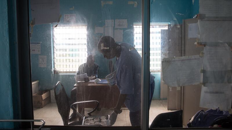 Medical staff organise before rounds in the TB Annex Hospital in Monrovia, Liberia. Photograph: Sally Hayden