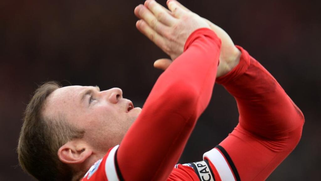 Manchester United’s Wayne Rooney will be hoping United can continue their fine form and regain some bragging rights. Photo: Oli Scarff/AFP