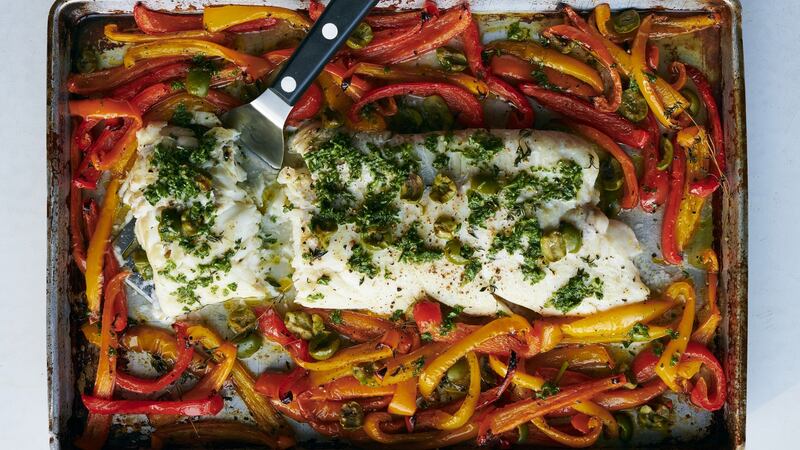 Roasted fish with sweet peppers. Photograph: David Malosh/The New York Times.