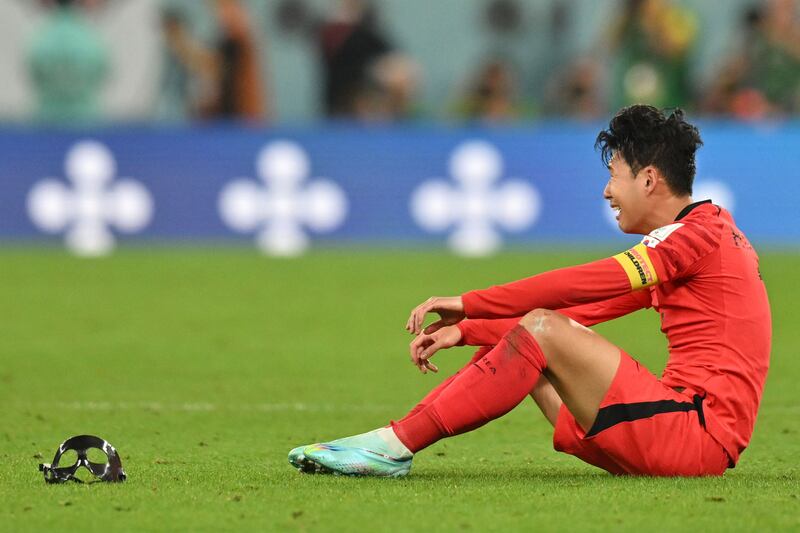 South Korea's Son Heung-min celebrates his team's victory against Portugal. Photograph: Glyn Kirk/AFP via Getty