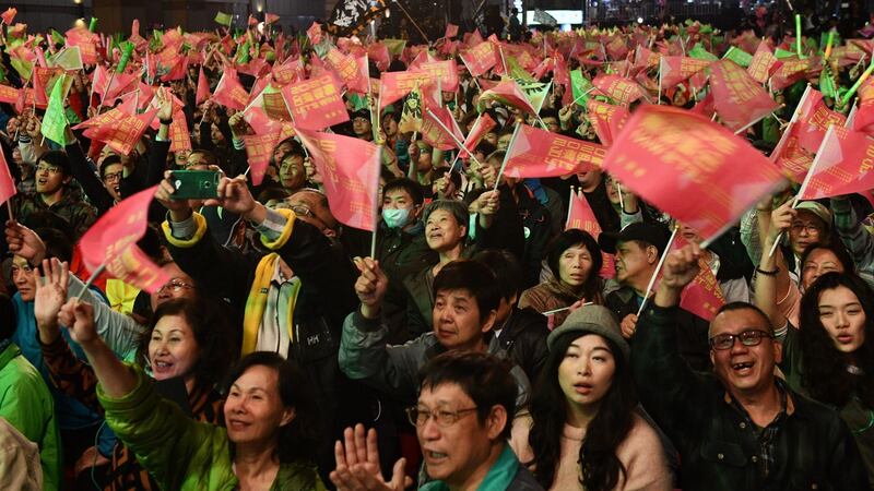 Supporters of Tsai Ing-Wen of the Democratic Progressive Party during a rally as the results of the presidential elections are announced  in Taipei, Taiwan. Photograph: Carl Court/Getty Images