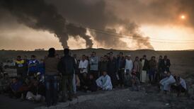 Suicide bombers in ambulances kill 21 people in Iraq