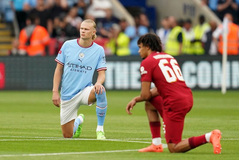 Manchester City's Erling Haaland and Liverpool's Trent Alexander-Arnold taking a knee before the FA Community Shield. Photograph: Nick Potts/PA