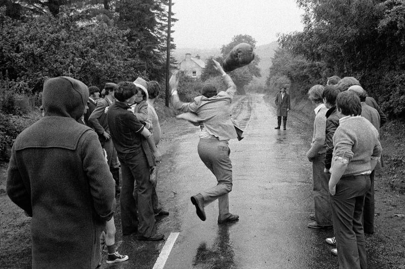 Bale-of-hay throwing competition, Drumkeeran Festival, Co Leitrim. From A Fair Day. 1983. © Martin Parr/Magnum Photos