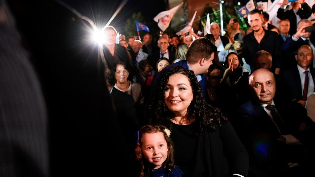 Vjosa Osmani, election candidate for prime minister from the opposition party Democratic League of Kosovo (LDK) with her daughter during an electoral rally in Pristina. Photograph: Armend Nimani/AFP via Getty