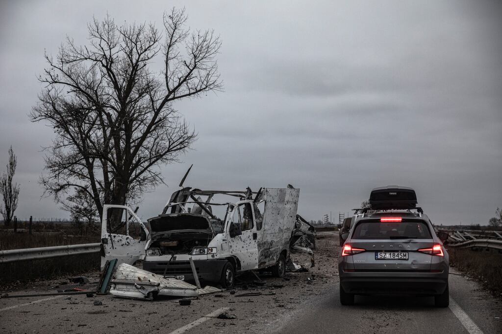 A destroyed vehicle on the road to the southern Ukrainian city of Kherson. Photograph: Finbarr O'Reilly/New York Times
