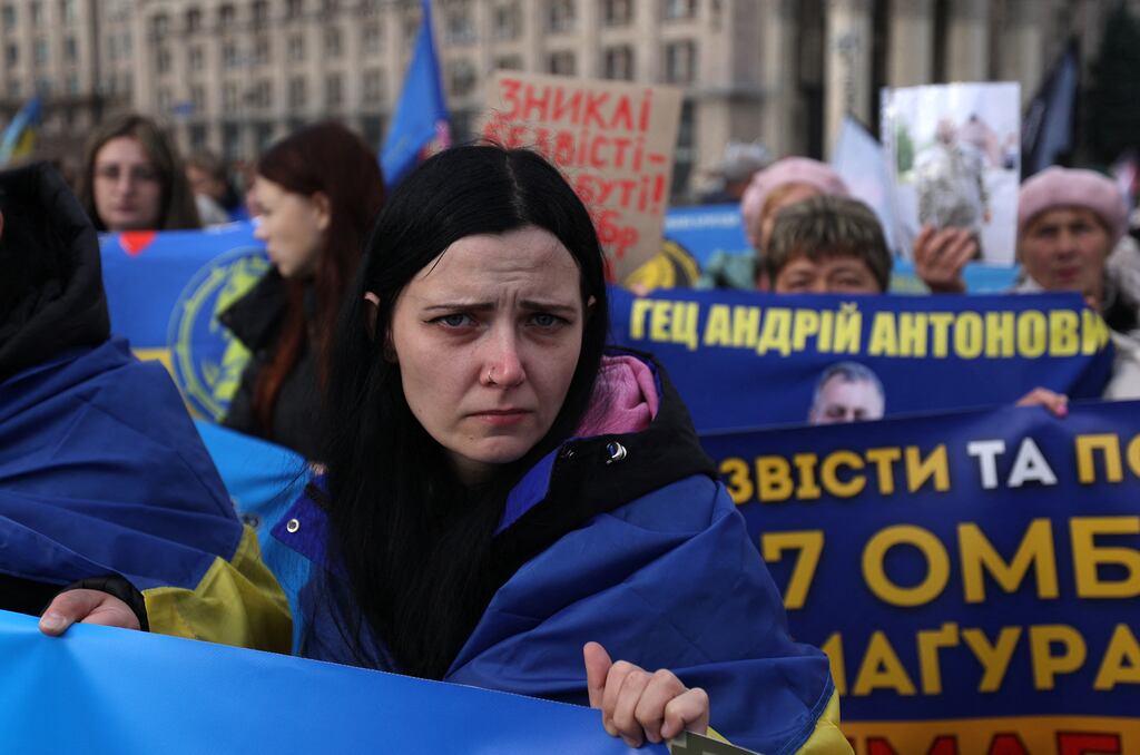 Relatives of missing Ukrainian servicemen during a rally at Independence Square in Kyiv. Photograph: Anatolii Stepanov/AFP via Getty Images