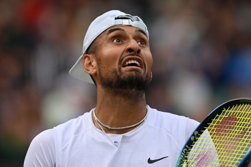 Nick Kyrgios speaks with the umpire against Stefanos Tsitsipas. Photograph: Justin Setterfield/Getty