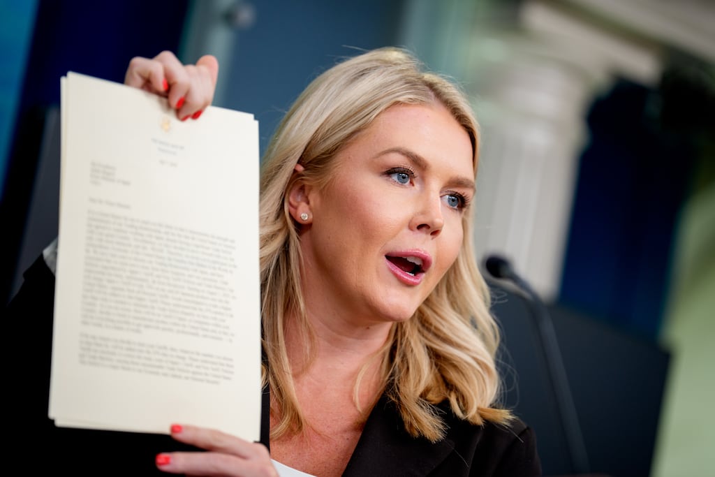 White House press secretary Karoline Leavitt holds up a copy of a letter to Japan, signed by US president Donald Trump, announcing 25% tariffs beginning on August 1st. Photograph: Andrew Harnik/Getty Images
