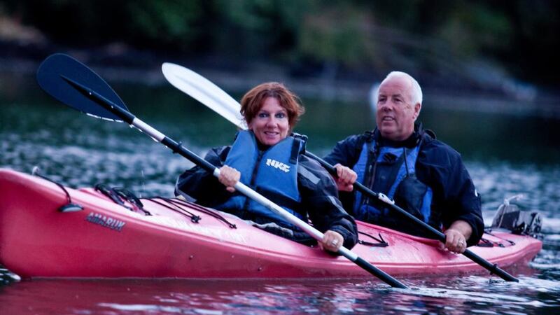 Hilary Fannin with Jim Kennedy of Atlantic Sea Kayaking taking part in a twilight sea kayaking trip. Photograph: Emma Jervis