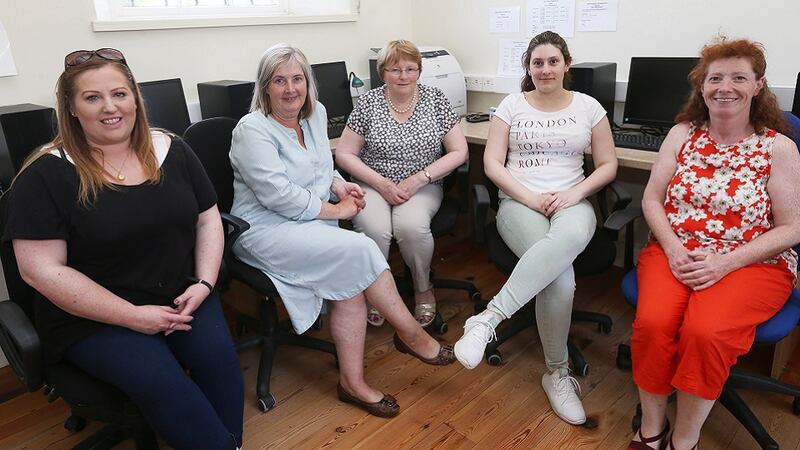 Valerie Carty, Breda Malone, Eileen Murphy, Dohanna Delta and Sylvia Lyons pictured in the old school in Ballon that will be used as an alternative office for commuters. Photograph: Laura Hutton/The Irish Times