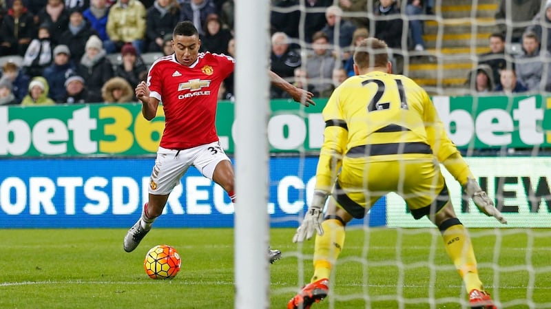 Jesse Lingard scores Manchester United’s second goal in the Premier league game against Manchester United at St James’ Park. Photograph: Carl Recine/Action Images via Reuters/Livepic