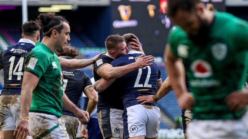 Huw Jones celebrates after scoring his try against Ireland. Photograph: Tommy Dickson/Inpho