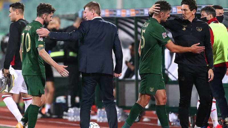 Stephen Kenny speaks to Robbie Brady after his first game in charge – a 1-1 draw with Bulgaria. Photo: Kostadin Andonov/Inpho