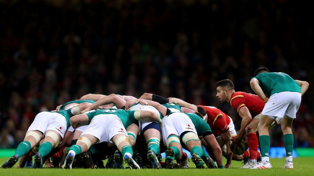 Conor Murray keeps a close eye on Rhys Webb during the Ireland-Wales match in the Six Naions. Photograph: James Crombie/Inpho