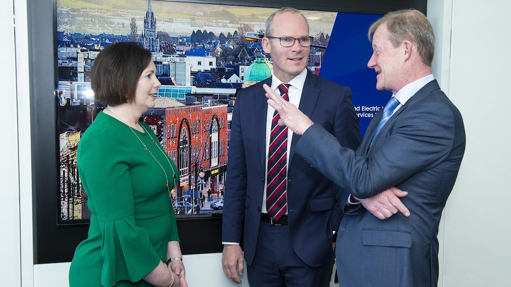 Tánaiste Simon Coveney with Marguerite Sayers, executive director of Electric Ireland and Mike Maloney, executive chairman of Abtran at the announcement of the Abtran and Electric Ireland customer services solutions partnership. Photograph: Gerard McCarthy